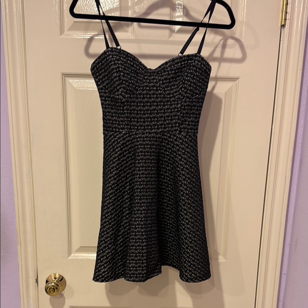 Black Mini A-line Dress with Sleeveless Design and Spaghetti Straps